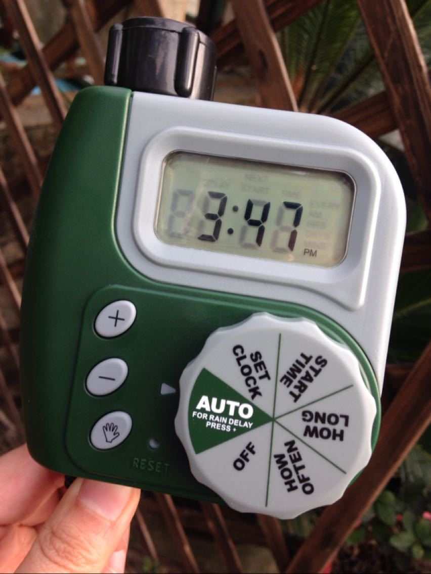 Intelligent LCD display garden irrigation controller with dial settings.