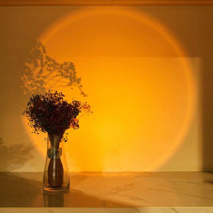 Led lights wireless nightlamp creating a warm sunset glow effect on wall.