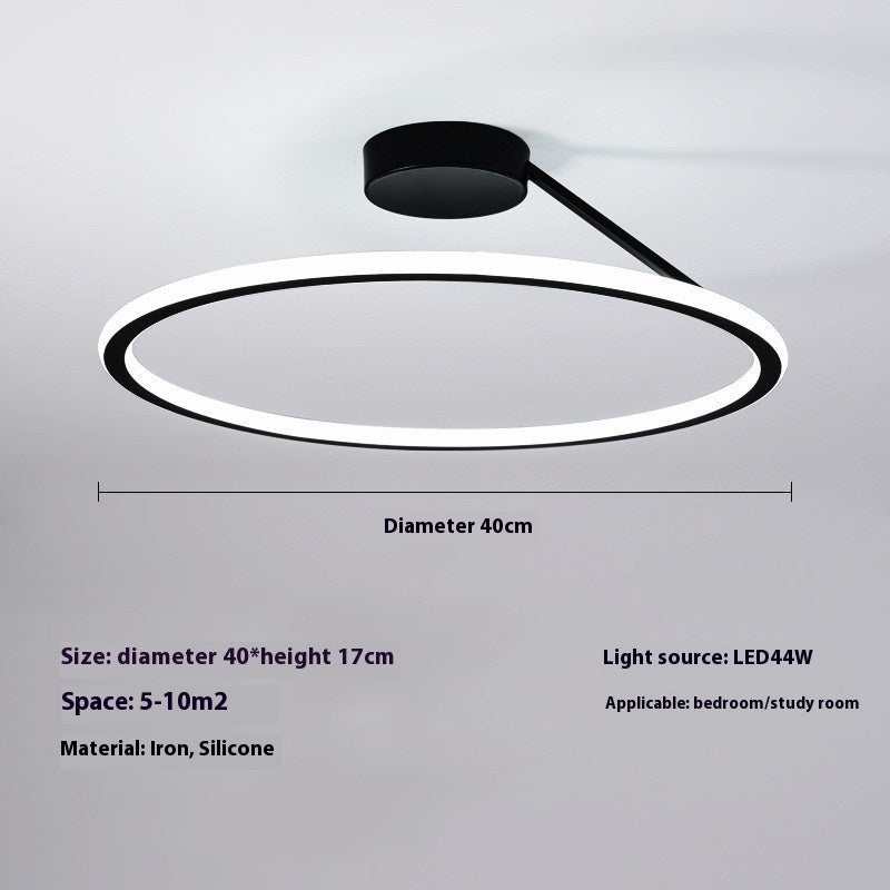 Modern LED ceiling light with black circular design, ideal for bedrooms and study rooms.