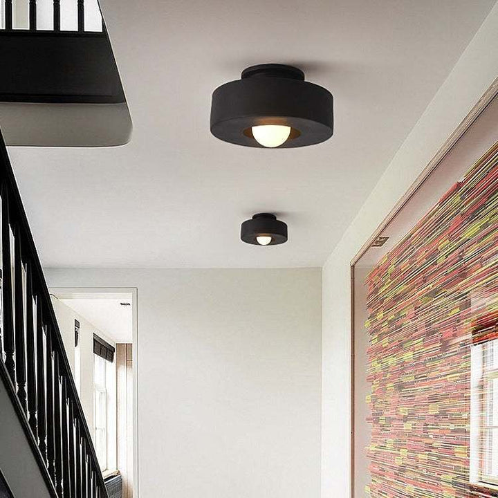 Nordic minimalist ceiling-mounted lighting fixture in modern interior.