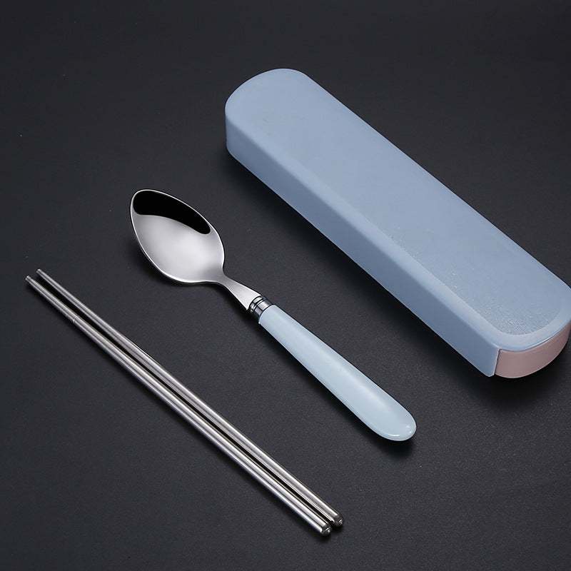 Portable Nordic stainless steel tableware set with spoon, chopsticks, and carrying case on a dark background.