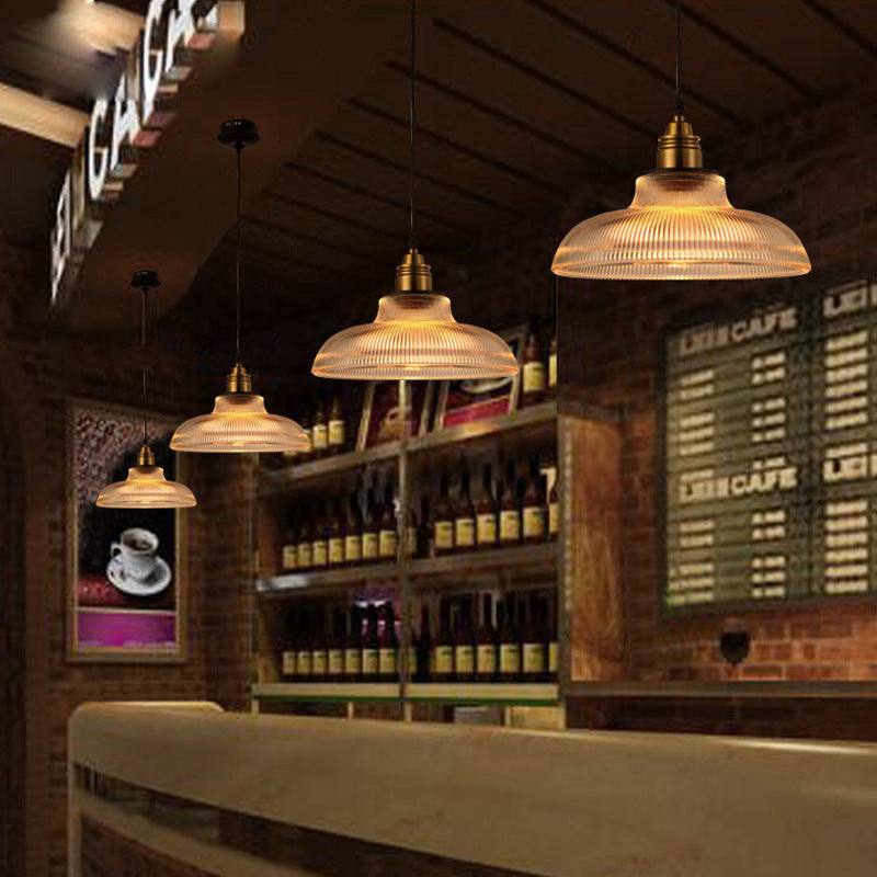 Nordic creative pendant lighting in an industrial-style café setting.