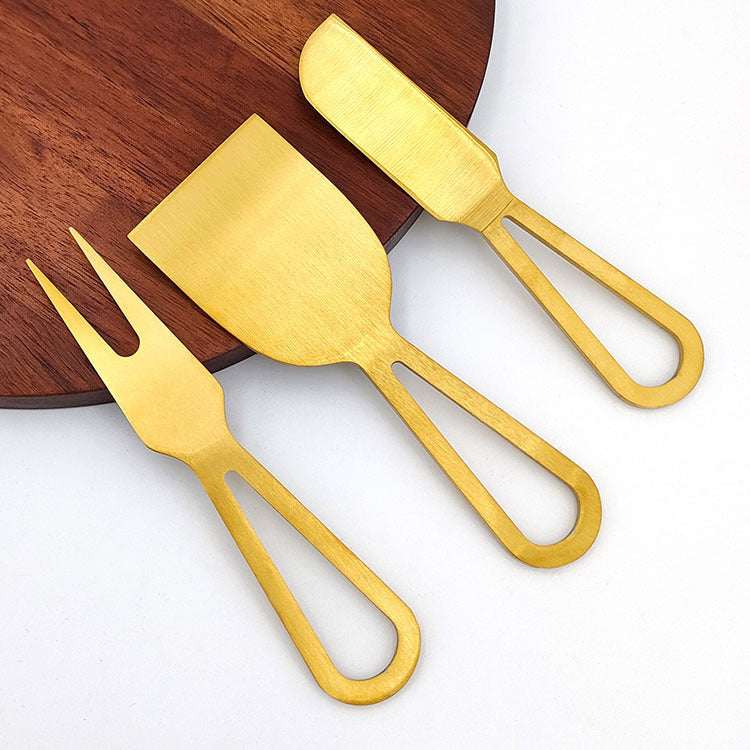 Stainless steel cheese knife and acacia wood board set.