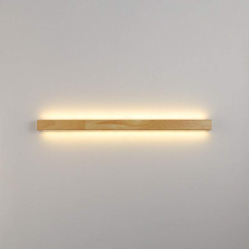 Nordic style log wall lamp in warm light for bedroom bedside background.