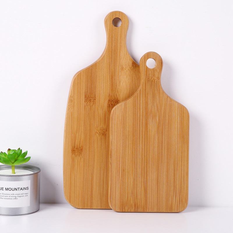 Modern minimalist wooden cutting boards with hanging handles made from beech wood.