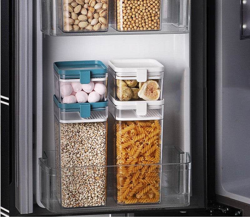 Modern kitchen with sealed storage jars containing various foods.