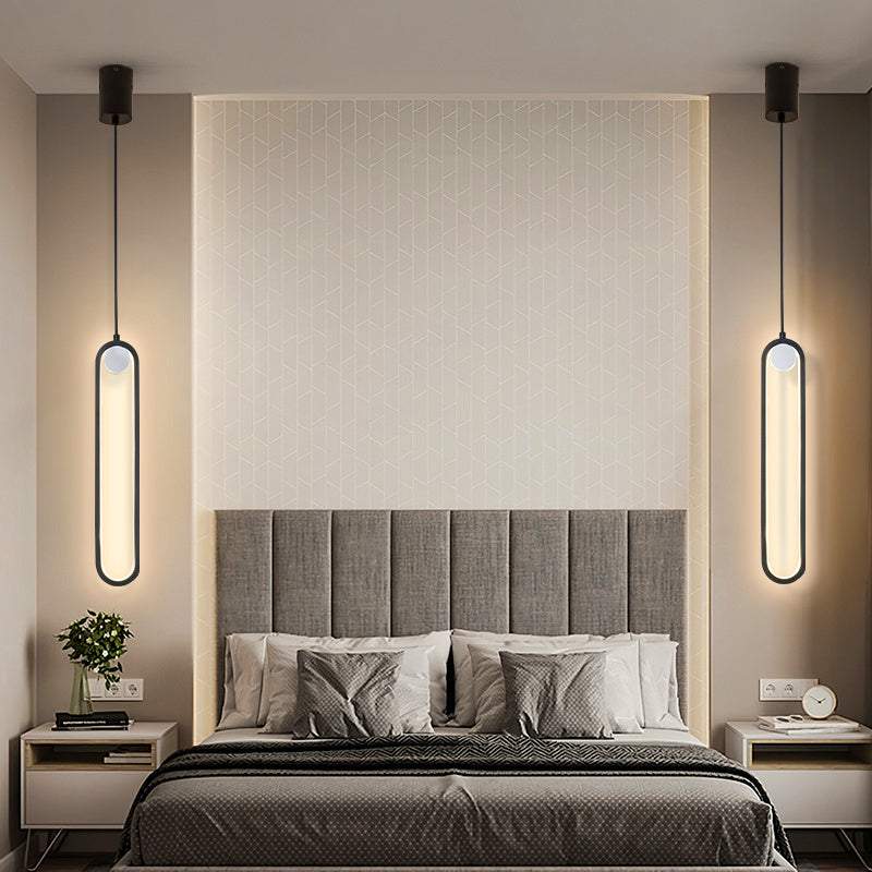Nordic minimalist oval bedside chandelier with LED light and aluminum alloy body, in black and gold.