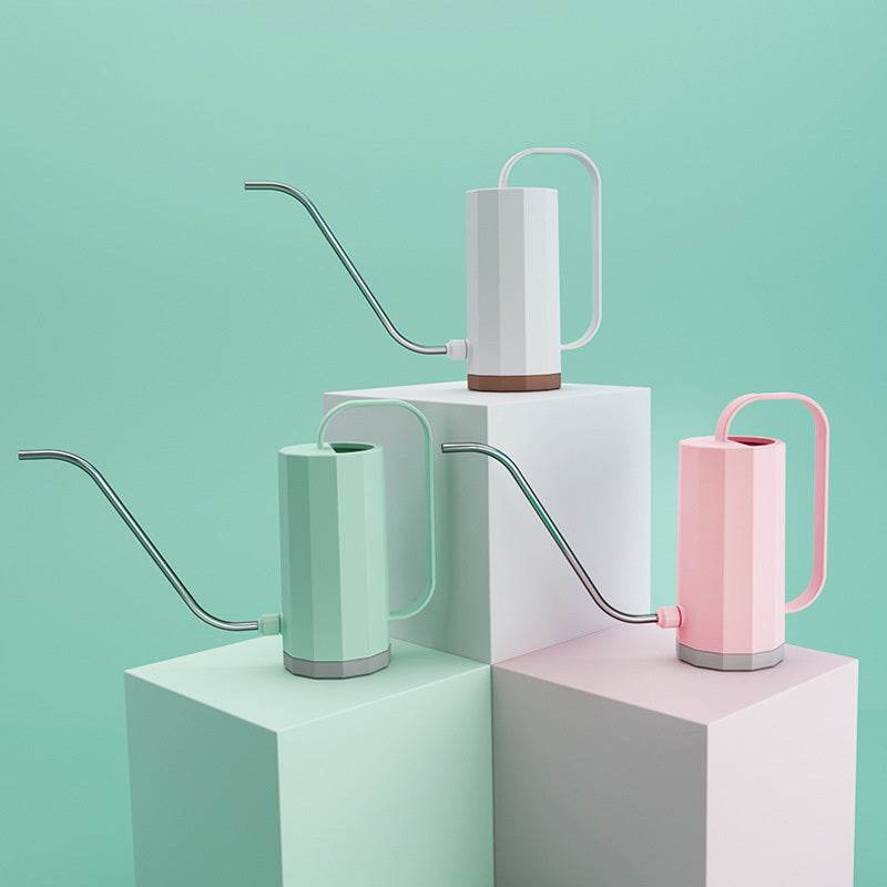 Plant watering can with long stainless steel spout, 1200ML capacity, for garden use.