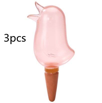 Potted plant waterers spike with bird design for houseplants.