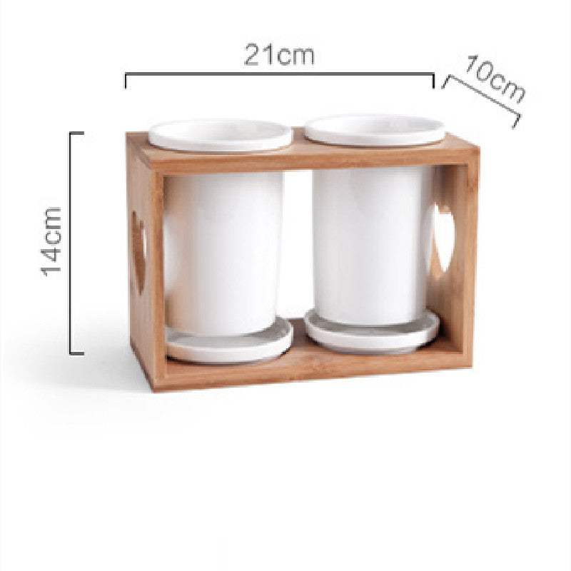 Nordic household ceramic chopstick holder with bamboo wooden frame, double cylinder design.