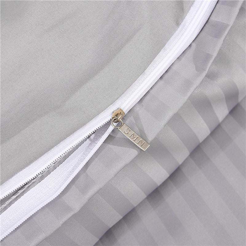 Flower bedding set with satin weave and geometric pattern.