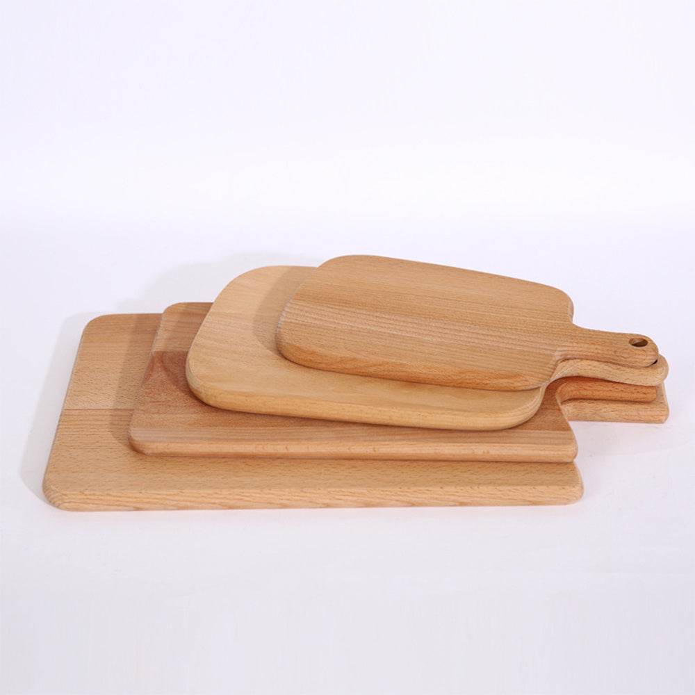 Modern minimalist wooden cutting boards with home handles for hanging, made of beech, showcasing smooth design and natural bamboo grain.