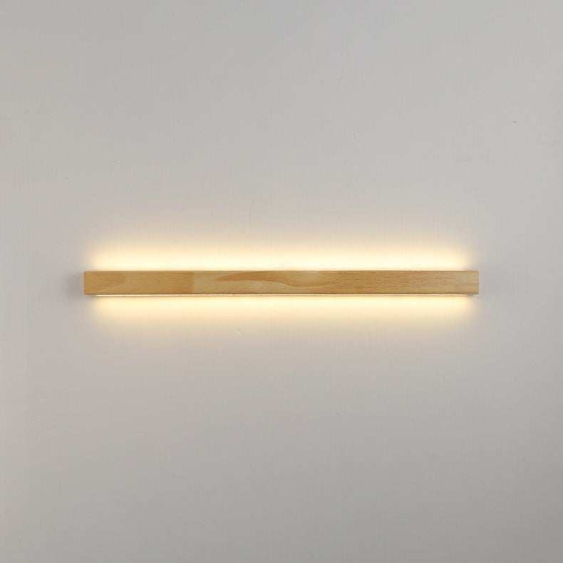 Nordic style bedside wall lamp with warm white light.