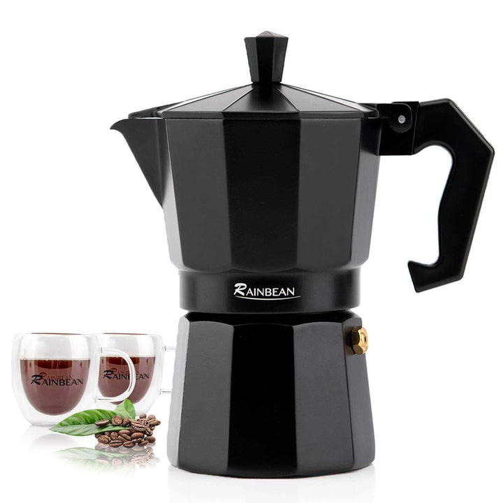 Black aluminum stovetop espresso maker with two glass cups for Italian coffee brewing.