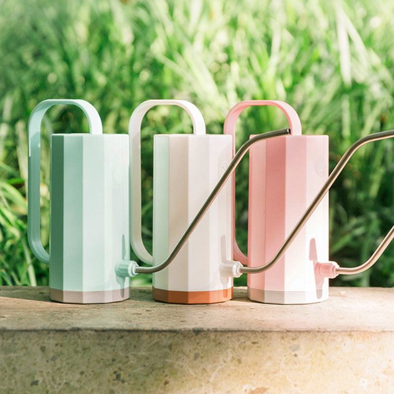 Stylish plant watering can with long stainless steel spout, 1200ML capacity, available in pastel colors.