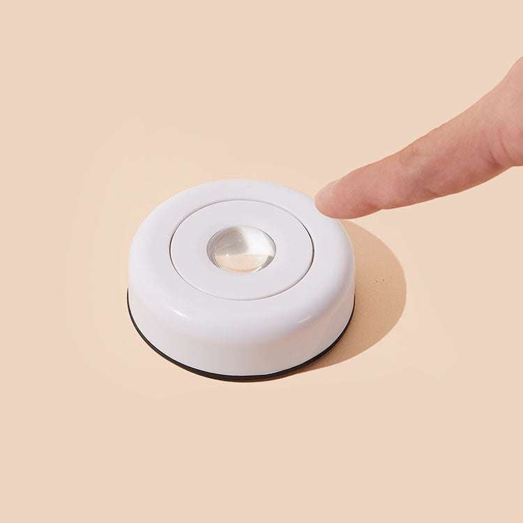 Wireless LED light with touch activation for closets and under furniture, made of durable ABS, battery powered, ideal for ambient and emergency lighting.