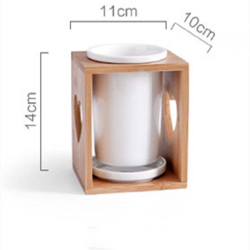 Nordic household ceramic chopstick holder with bamboo wooden frame.