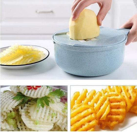 8 In 1 mandoline slicer in use for cutting potatoes, featuring crinkle cut slices and waffle fries with included strainer.
