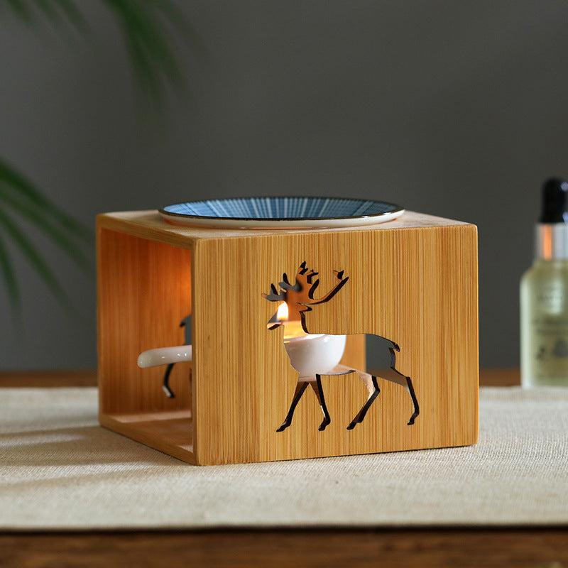 Bamboo candle lamp with aromatherapy setup and decorative wooden cover.