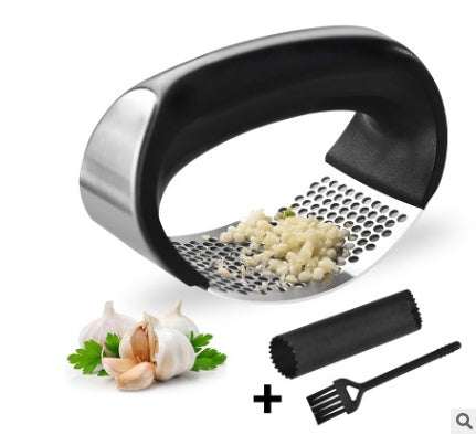 Stainless steel garlic press with ergonomic handle and garlic clove accessory set.