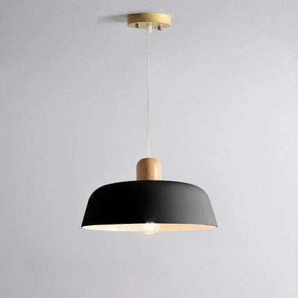 Nordic wood pendant lighting fixture in black for kitchen and dining room decor.