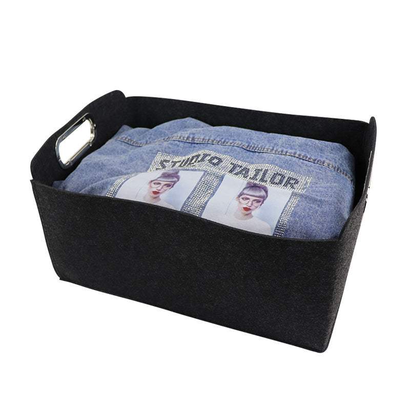 Nordic Felt Storage Basket with handles storing clothing items.