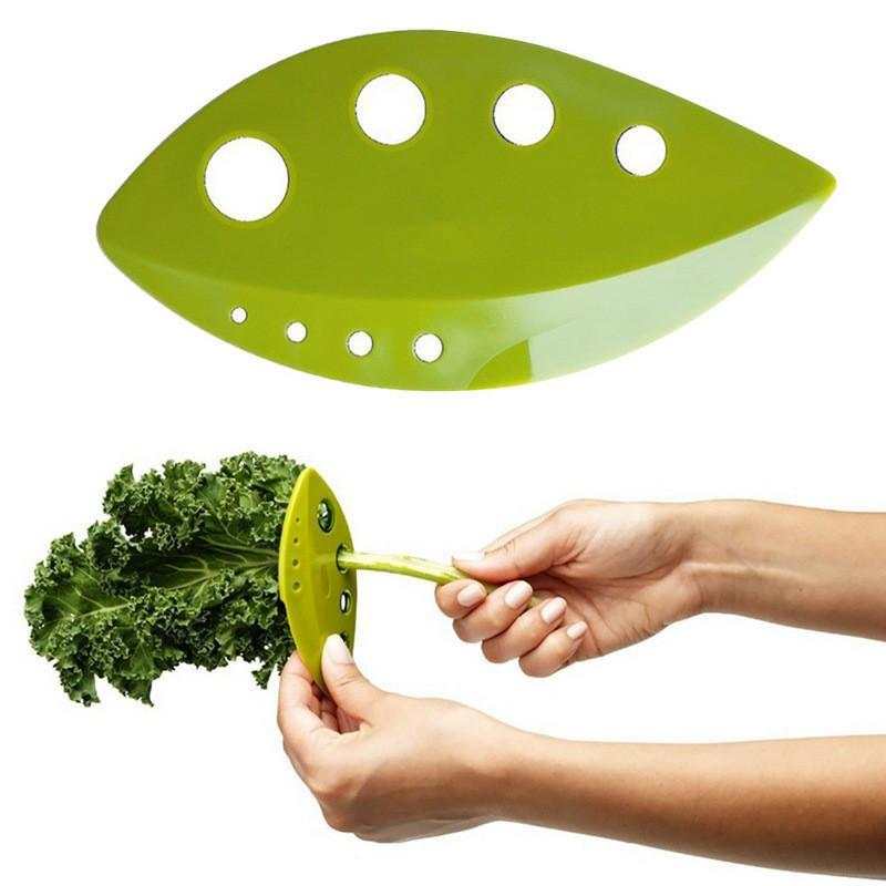 Green herb stripper leaf tool in use.
