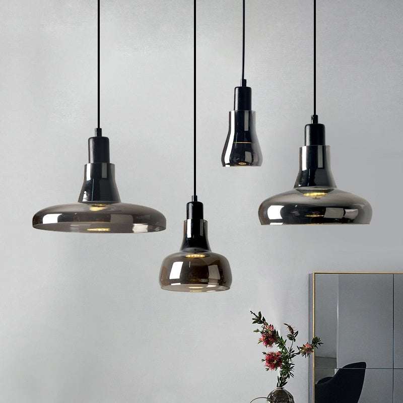 Creative Glass Shadow Chandelier with LED lighting, featuring a modern glass design and warm spot light illumination.