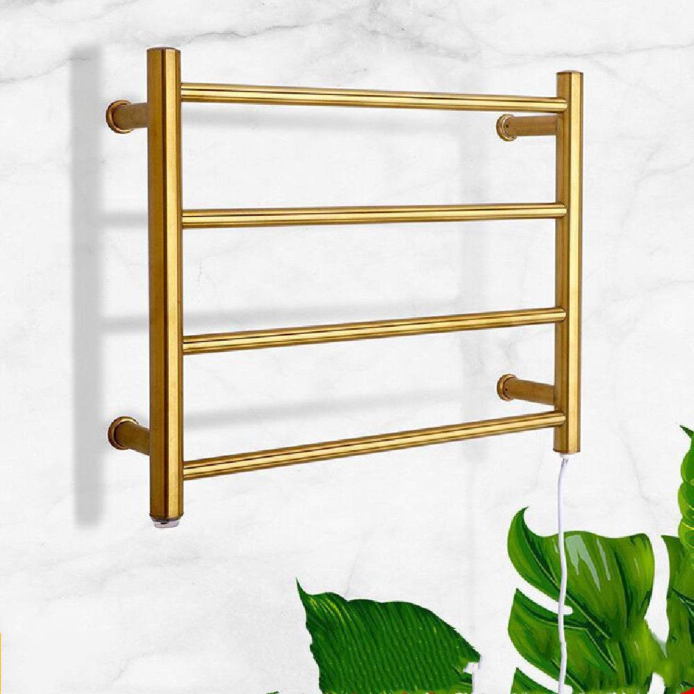 Stainless steel heated towel rack in gold finish, modern minimalist style, mounted on a bathroom wall.