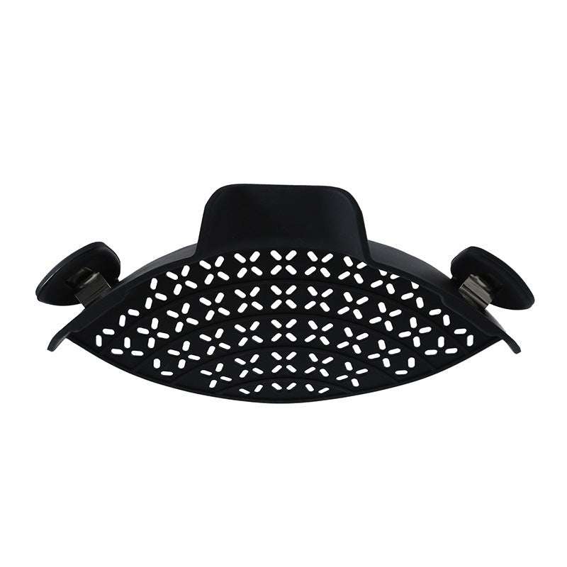 Modern black silicone pot side drain stopper with stainless steel clips, ideal for spill-proof kitchen use.