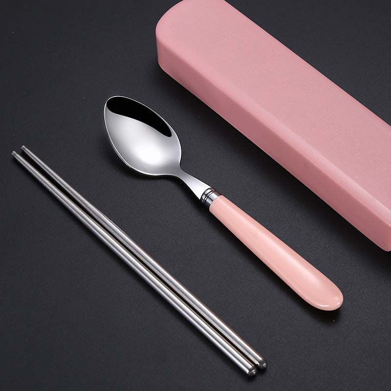 Portable Nordic tableware set with stainless steel spoon and chopsticks in pink case.