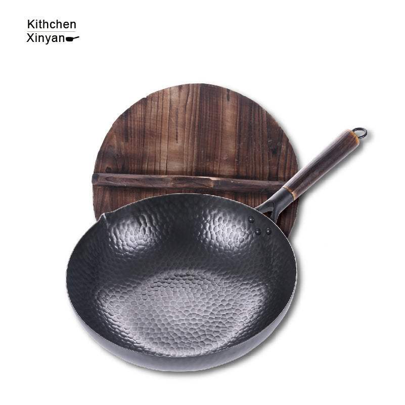 Traditional iron pan with wooden handle and lid, featuring high-quality refined iron and natural finish.