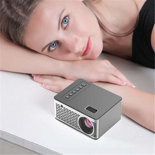 Compact USB smart projector with orthographic front projection, 320x240 resolution, and versatile power regulations.