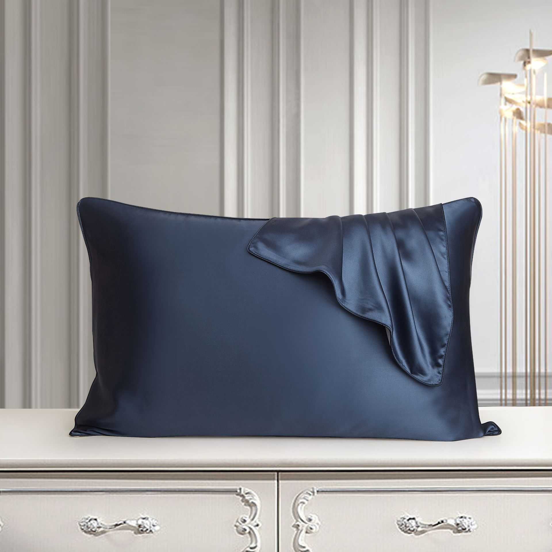 Silk Pillowcase in luxurious mulberry silk on elegant bed setting.