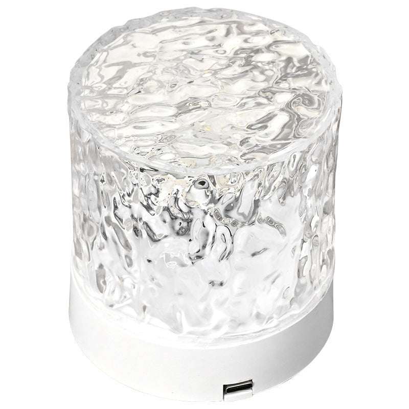 Modern acrylic water ripple rotating night light with tricolor projection. 