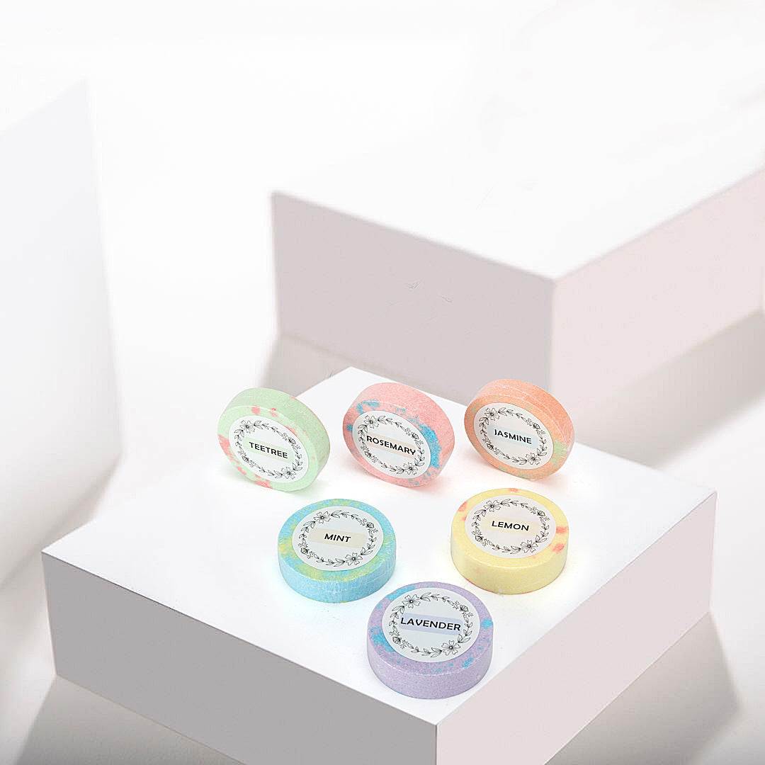 6-piece Home Spa Mini Relaxation Bath Bombs, assorted colors, displayed on white blocks.