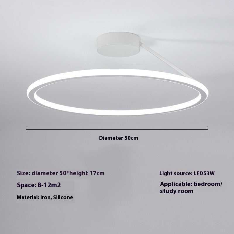 Simple modern LED ceiling light, round design, suitable for bedrooms or study rooms.