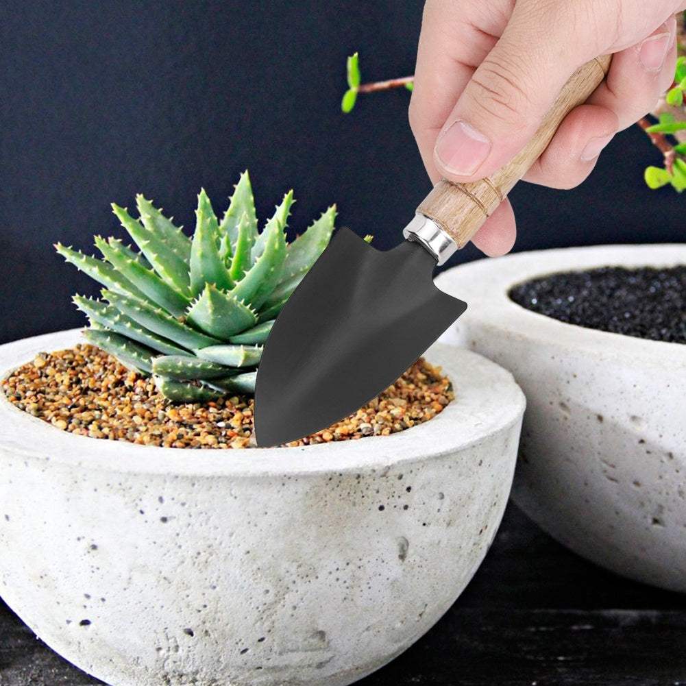 Mini plant gardening tools set including spade, claw rake, and shovel for potted plant care.