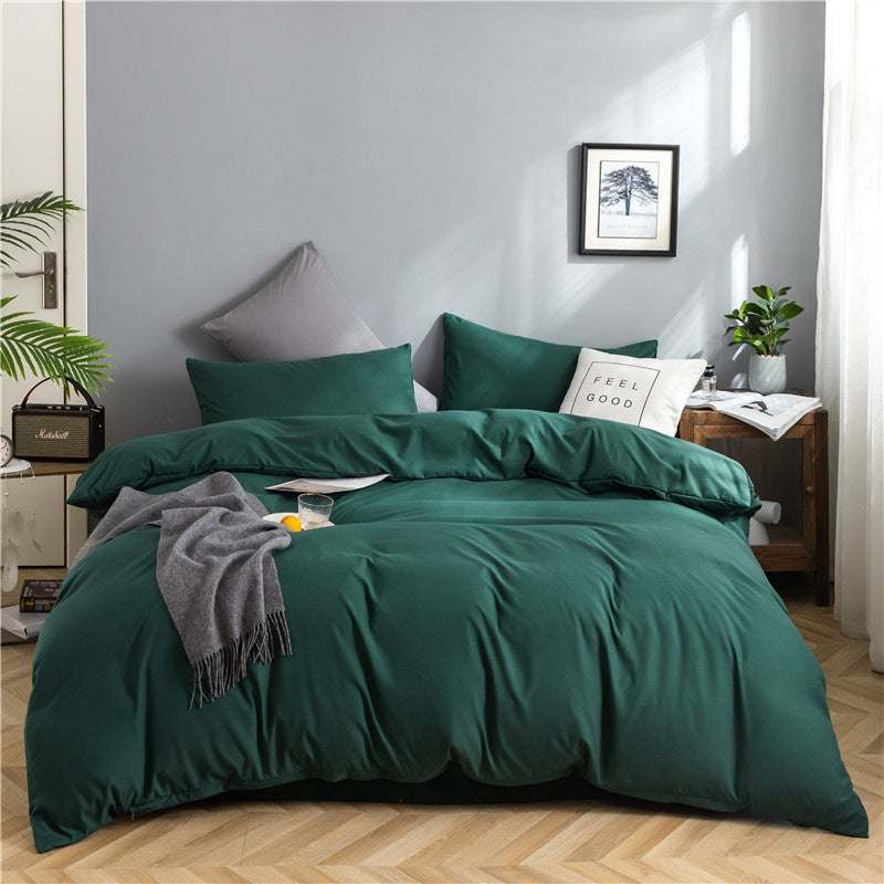 Modern minimalist washed cotton bedding set with geometric pattern on a 1.8m bed, featuring bamboo fiber fabric in a deep green hue.