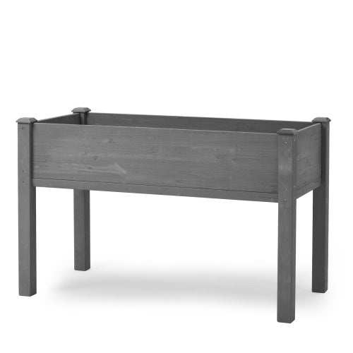 Elevated wooden garden bed with legs in grey solid wood for outdoor plants.