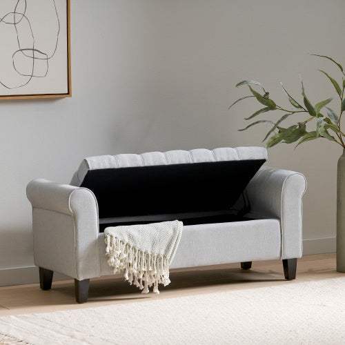 Light grey HAYES ARMED STORAGE BENCH with rolled arms and tufted lid open for storage.