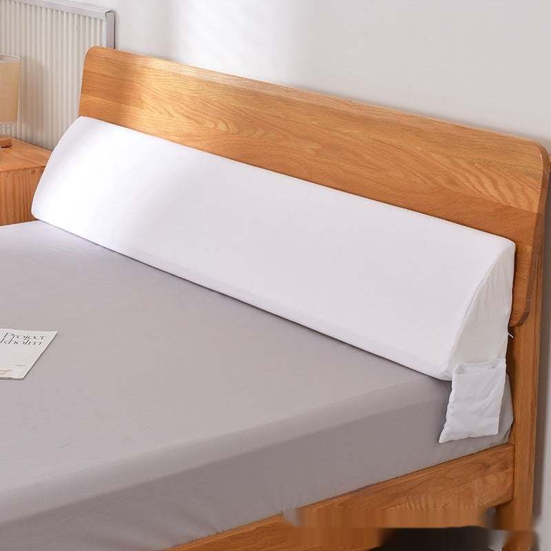 Long pillow triangle wedge in white, designed to fill bed gaps, featuring modern simplicity style.