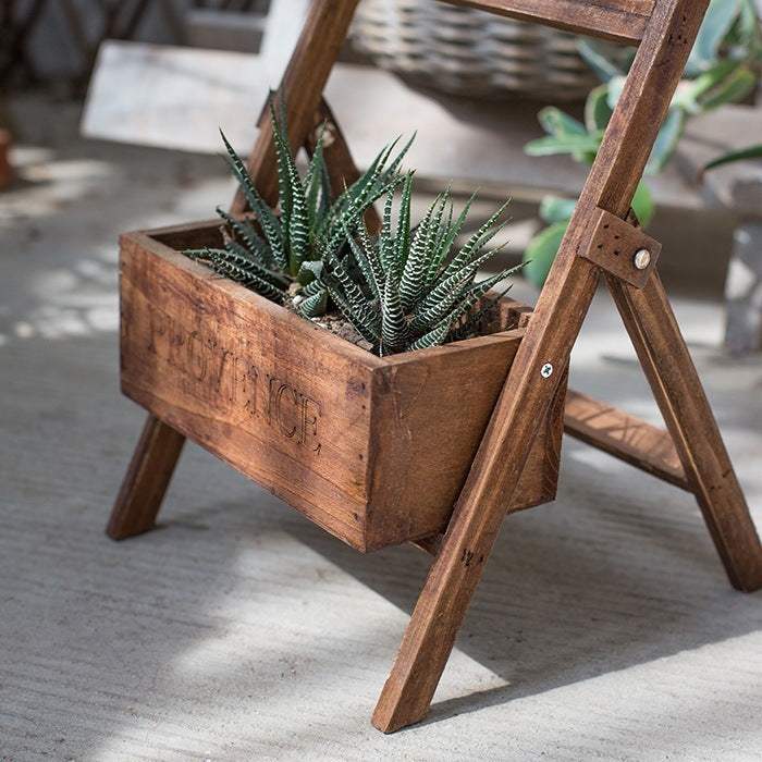 Medium solid wood flower box for garden decorations with small blackboard.