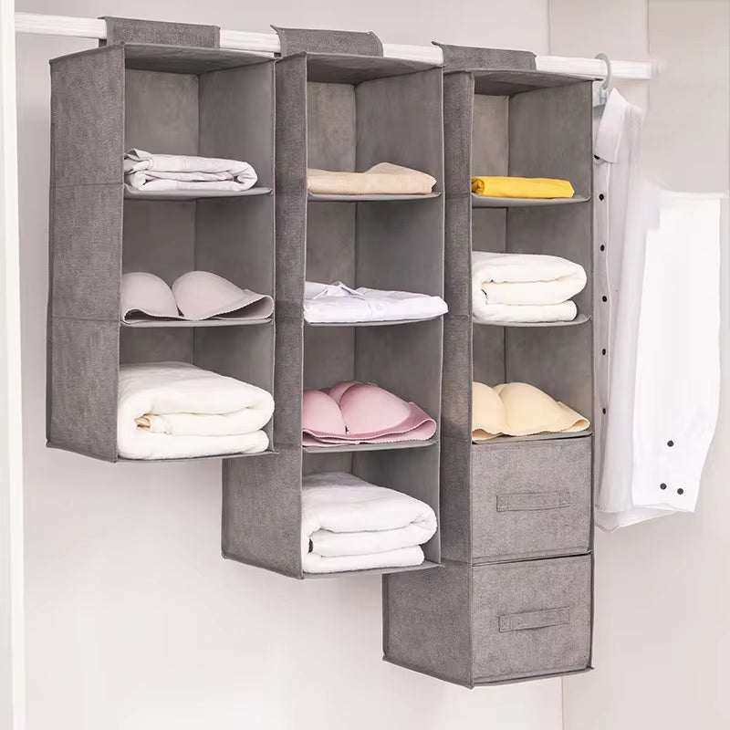Drawer storage closet hanging bags with multiple compartments in gray cotton cloth.