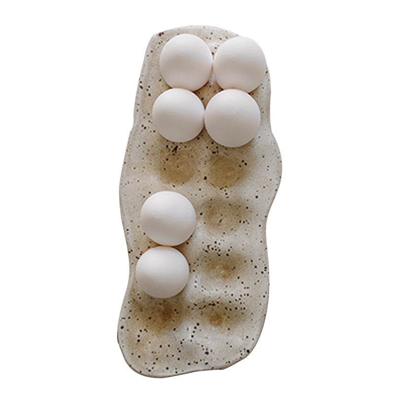Nordic style resin egg storage box with six cells for kitchen use.