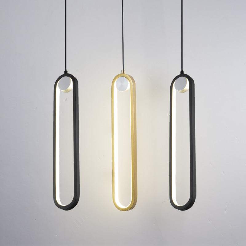 Nordic minimalist oval bedside chandelier with LED lights in black and gold.