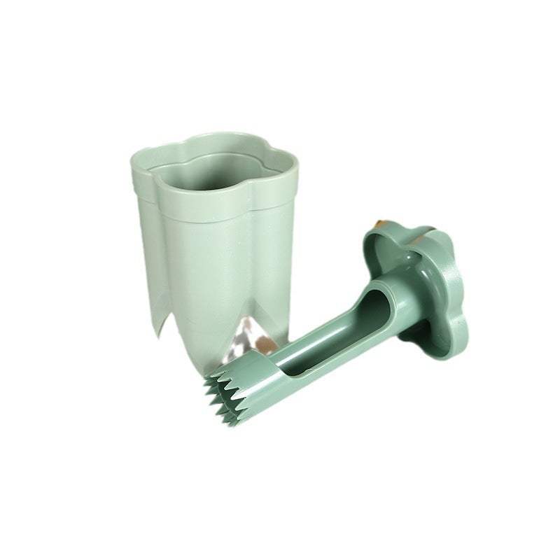 Modern simplicity kitchen tool for core removal in green, designed for easy household use.