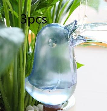 Cute bird-shaped potted plant waterer spike automatically watering houseplants.