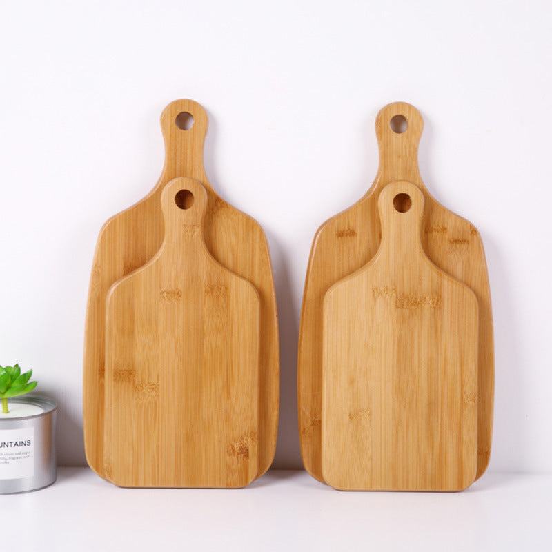 Home handle for hanging wooden cutting boards made of beech, modern minimalist style.