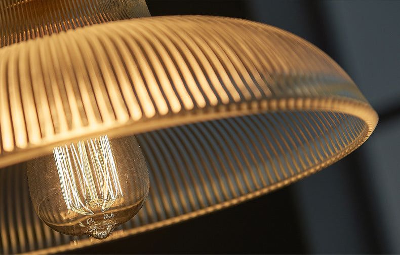 Nordic creative industrial glass chandelier with warm LED light.